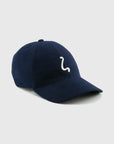 Navy blue cap with a white logo on a light gray background