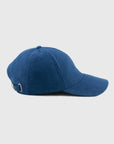 Blue cap on a light gray background