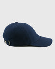 Navy blue baseball cap on a light gray background