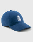 Blue cap with a white logo on a light gray background