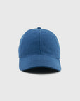 Blue baseball cap on a light gray background