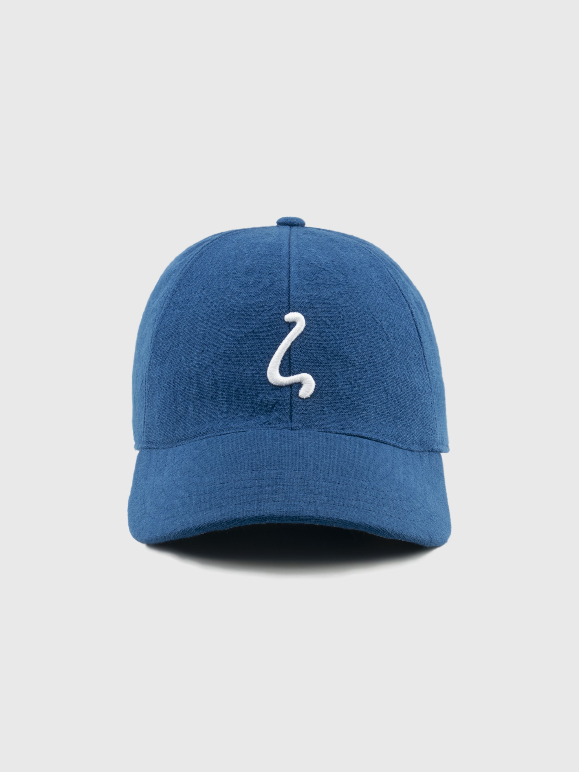 Blue cap with a white logo on a light gray background