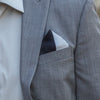Lesovs Black and Gray Triangles Pocket Square Folded in Suit Pocket