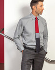 Lesovs-Gray-Block-Silk-Tie-and-man-in-stairway